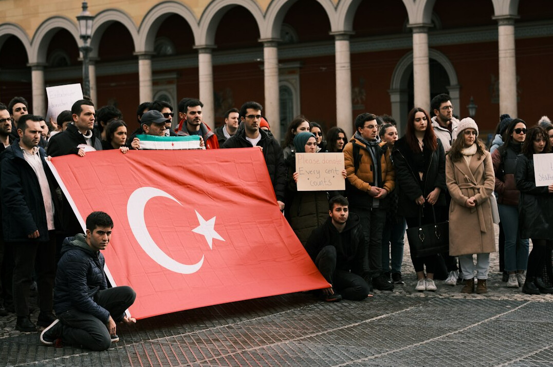 Team of Turkish media conflict resolution trainers standing together